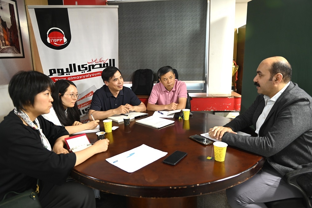 Chinese experts at Al-Masry Al-Youm symposium warn that US and Israel are harming global economy