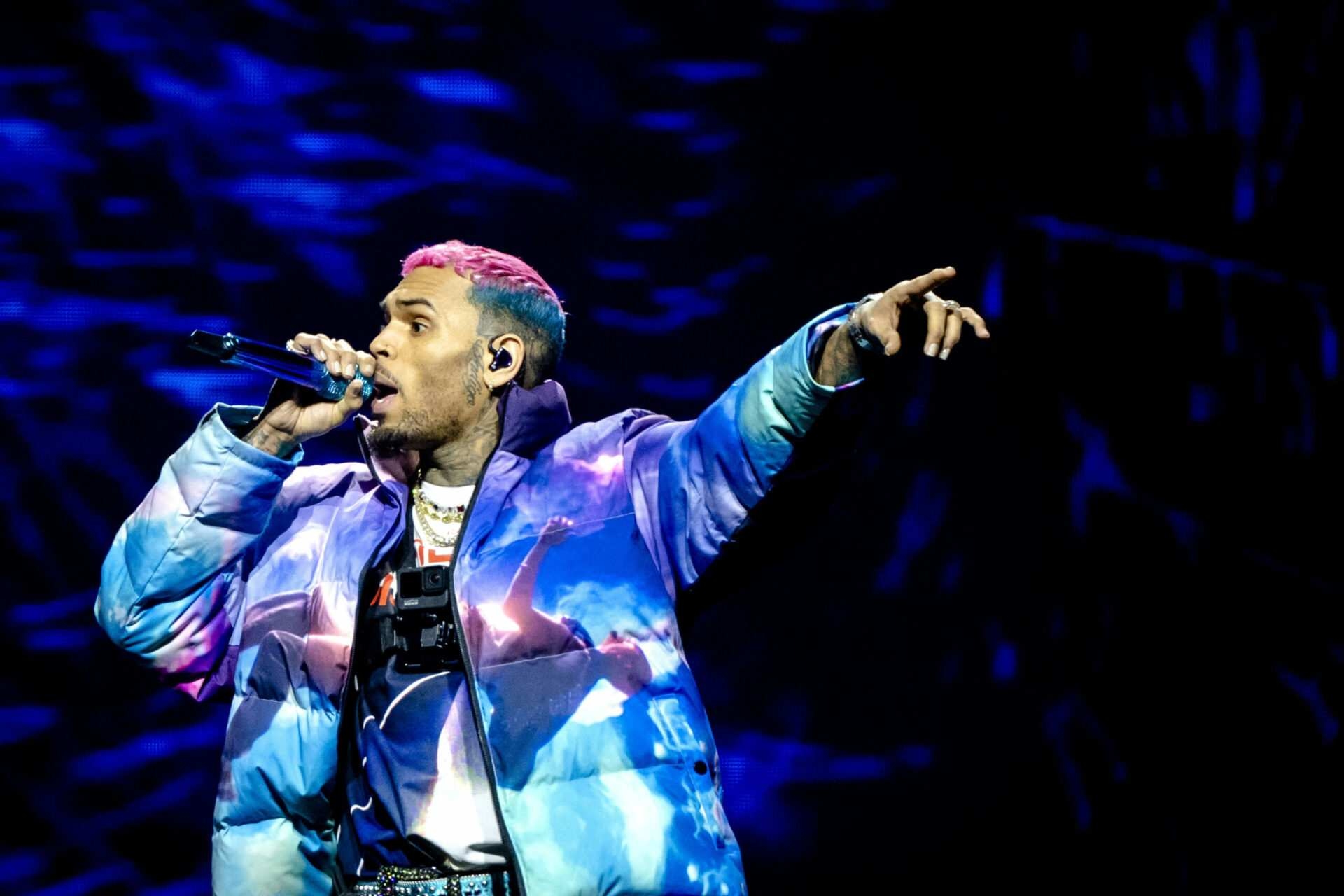Chris Brown arrested in UK for allegedly smashing tequila bottle over music producer's head in 2023