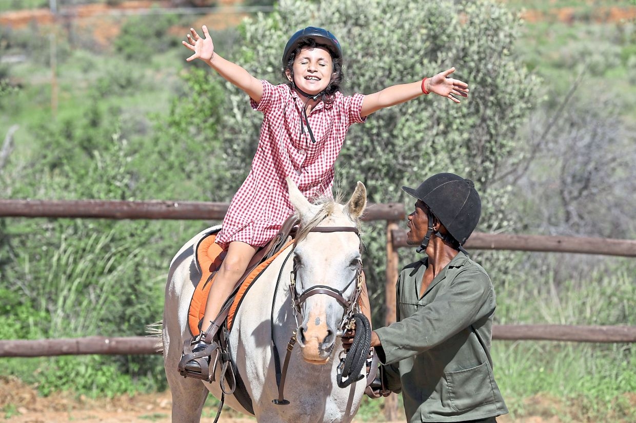 Horse therapy program brings joy to kids with learning disabilities in Namibia