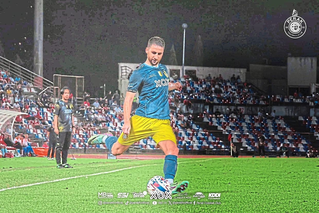 Beleaguered Perak hopeful of finding white knight