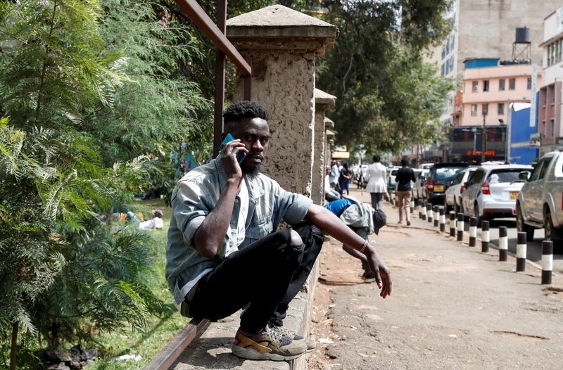 Club-wielding Kenyans vow to 'protect' Nairobi as protest marks deadly anniversary
