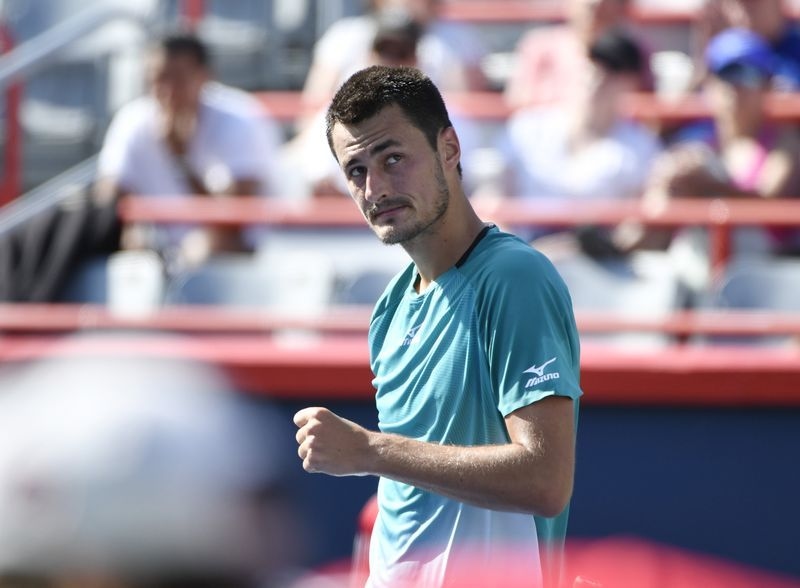 Tennis-Forgotten man Tomic earns first Tour win since 2021
