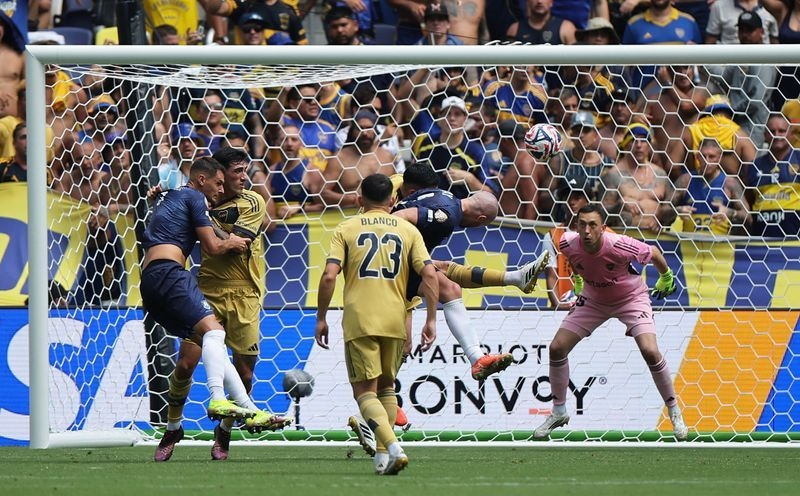 Soccer-Schoolteacher Grey scores dream goal as amateur Auckland City hold Boca Juniors to a draw