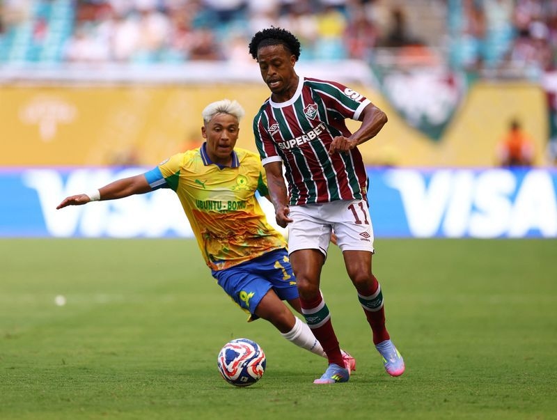 Soccer-Fluminense do just enough to achieve last-16 objective