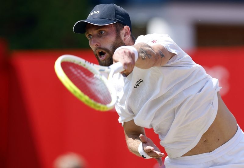 Tennis-Moutet reaches first grasscourt semi-final after tense win over Tien