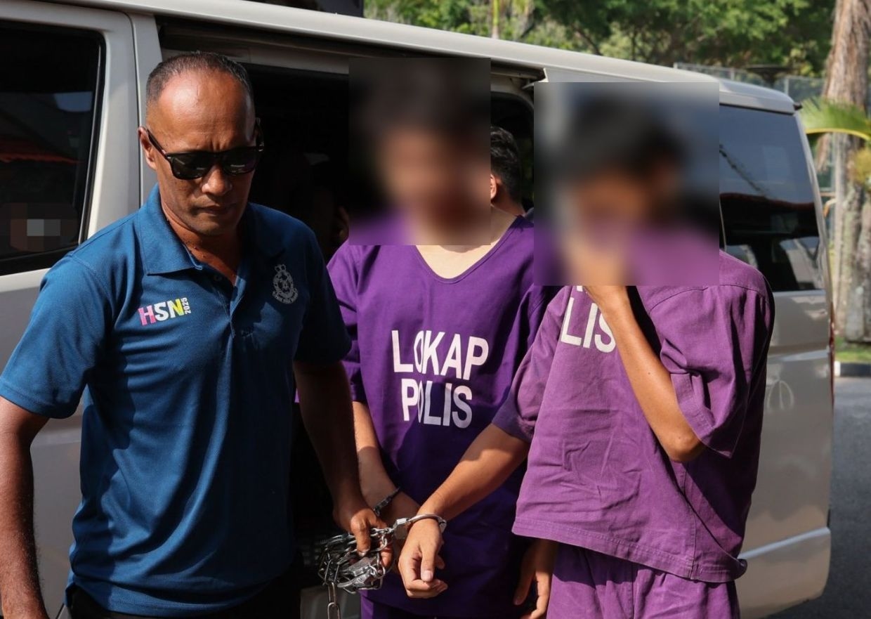 Two college students remanded for three days over bullying case