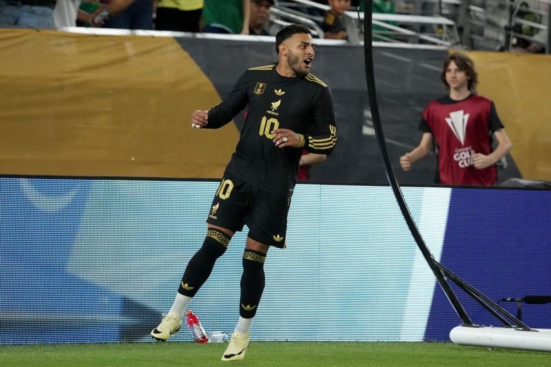Soccer-Vega's strike, Madu's own goal send Mexico to semis with 2-0 win over Saudi Arabia