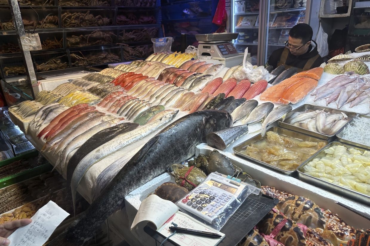 China lifts a nearly 2-year ban on seafood from Japan over Fukushima wastewater