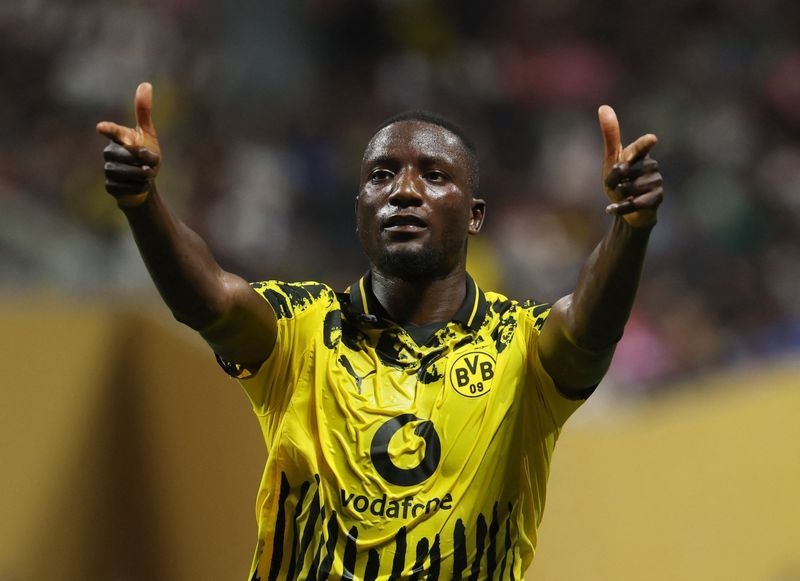 Soccer-Dortmund hold off Monterrey to reach Club World Cup quarter-finals