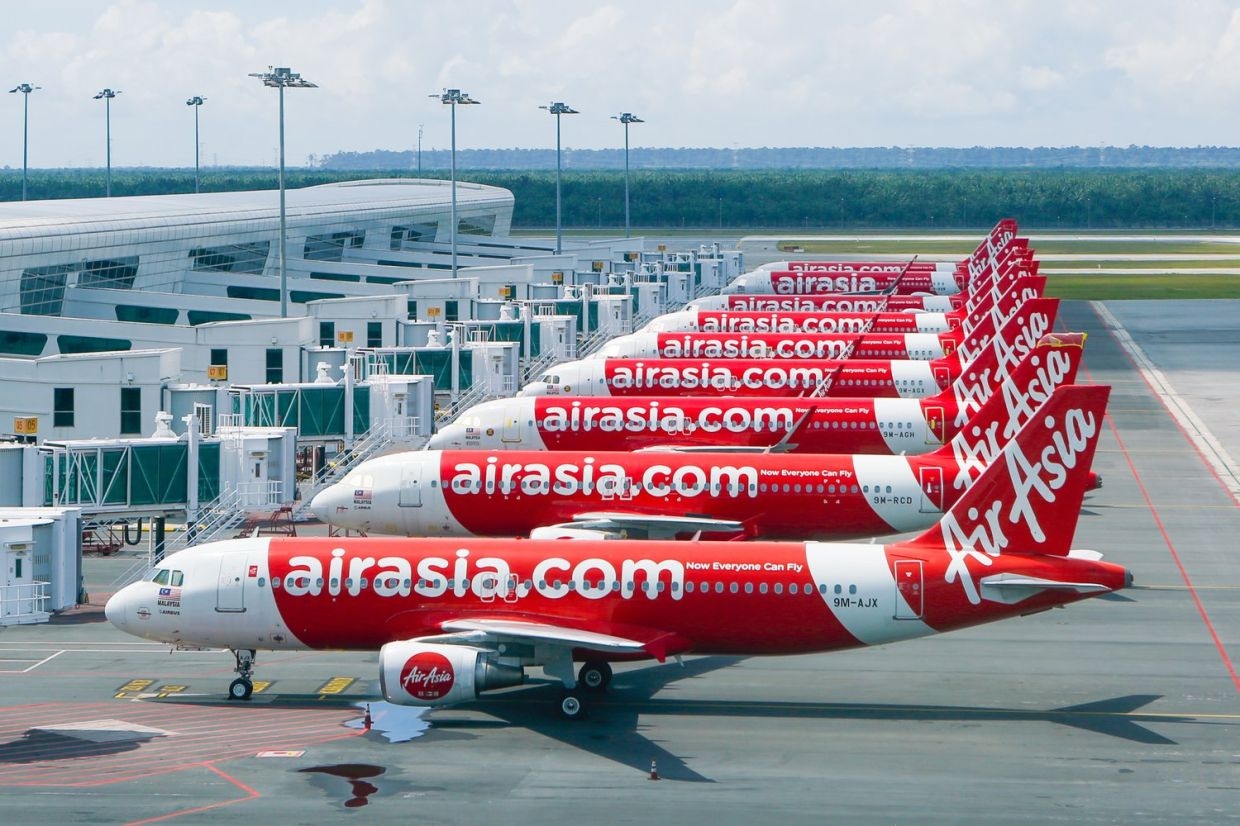 AirAsia in talks to convert some Airbus orders into long-range jet orders, sources say