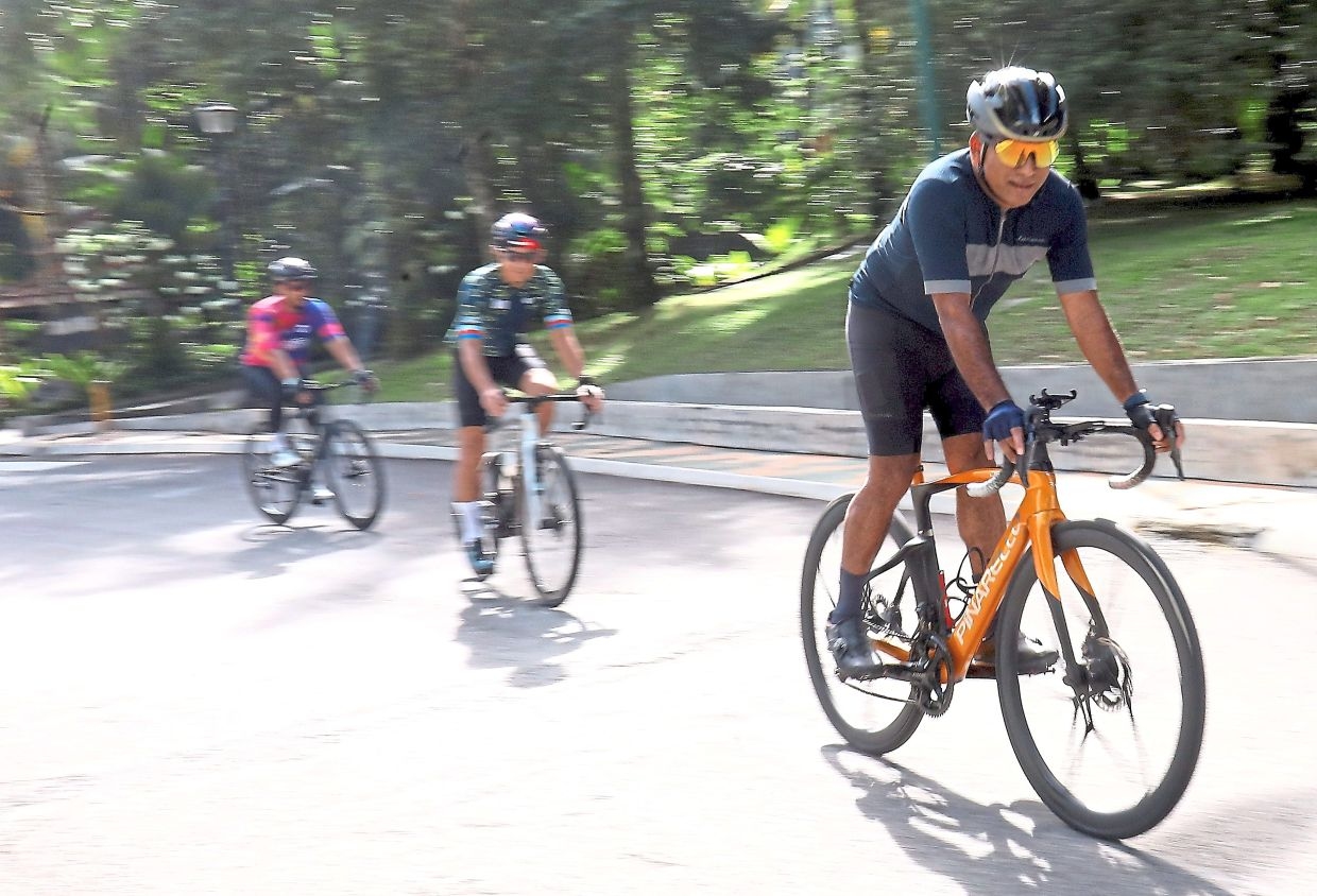 Three Malaysian top executives cycle to stay fit, focused and fulfilled
