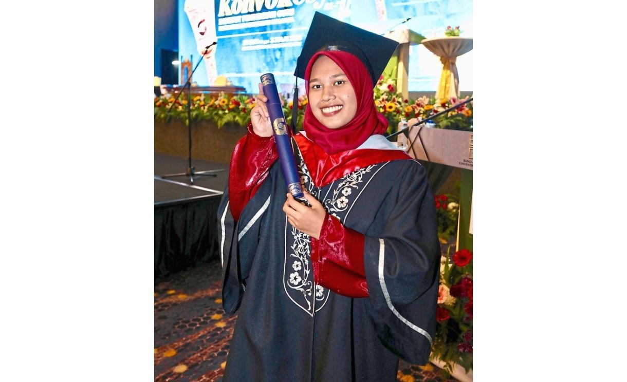 Cancer survivor goes from battle to blackboard