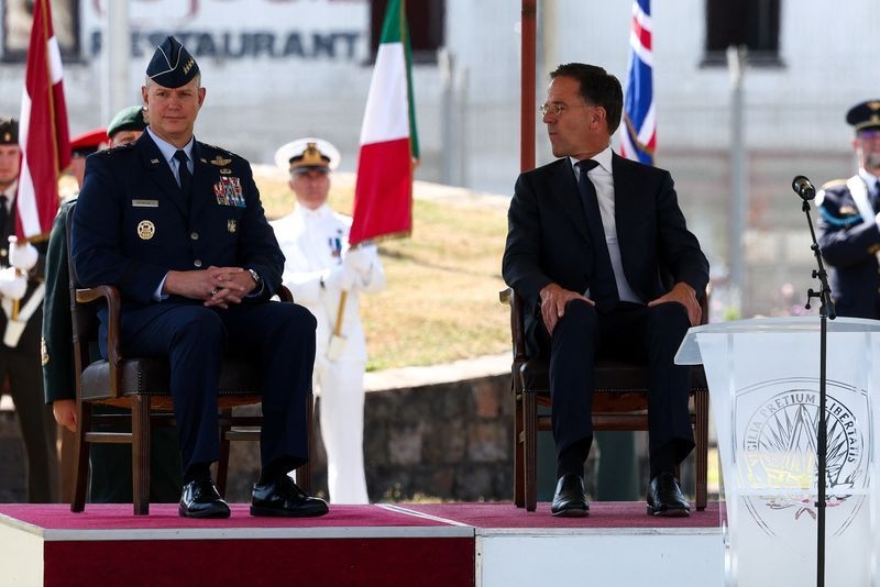 New NATO commander stresses unity at handover ceremony