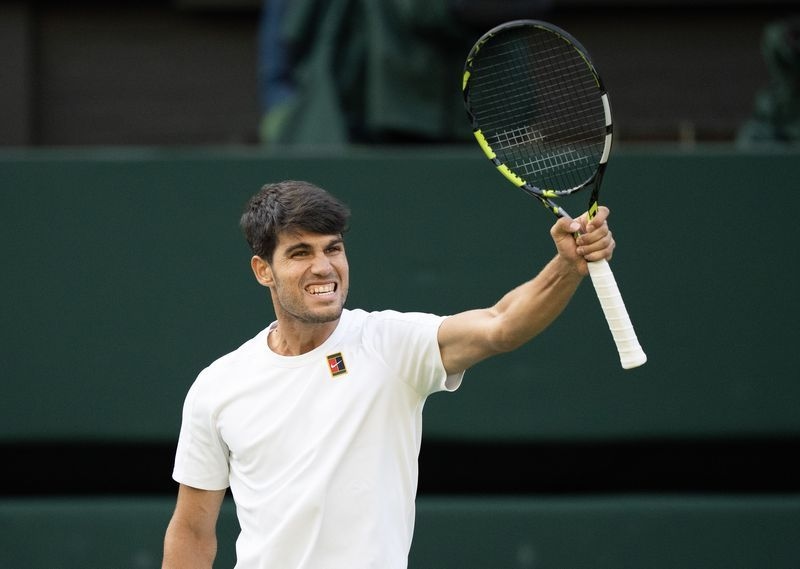 Tennis-Alcaraz marches on at Wimbledon after tough test, Keys and Osaka crash