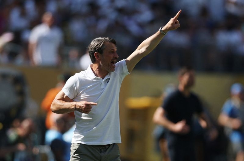 Soccer-Dortmund coach Kovac calls for later kickoffs after scorching Club World Cup