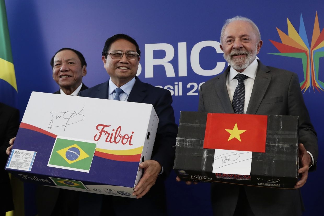 Brazil opens BRICS summit in Rio, leaders of growing bloc, however, gather, without Xi or Putin