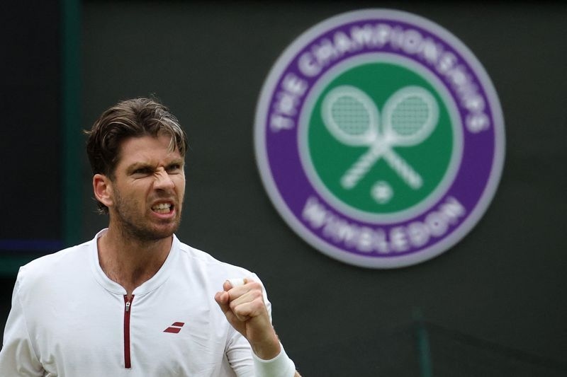 Tennis-Norrie sees off big-hitting Jarry in thriller to reach last eight