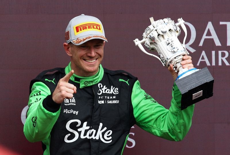 Motor racing-Hulkenberg rids himself of unwanted record at the 239th attempt