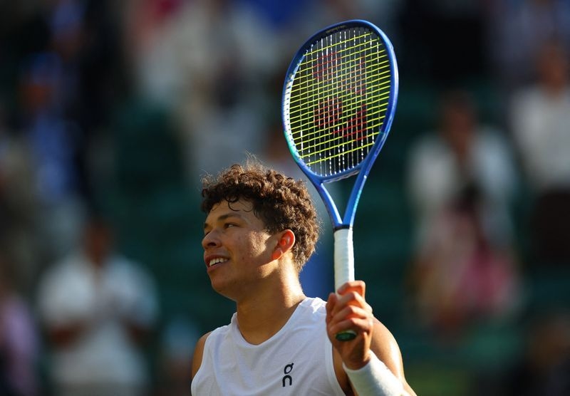 Tennis-Shelton gets one up on dad as he battles to Wimbledon quarter-finals