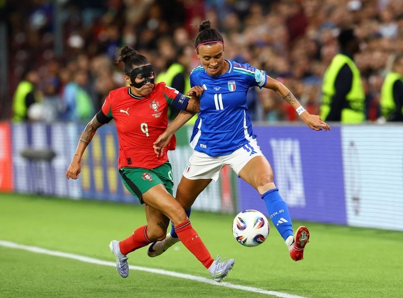 Soccer-Portugal's Euro campaign still alive after 1-1 draw with Italy