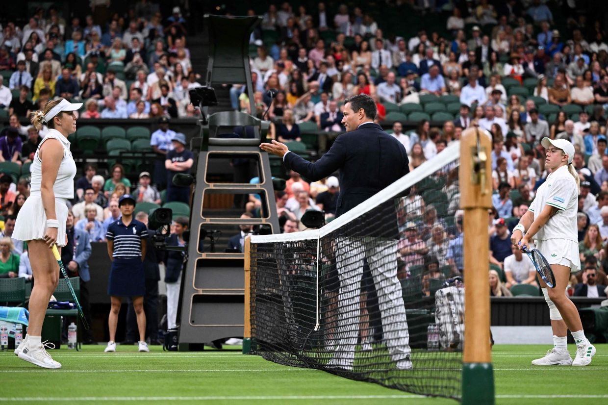 Wimbledon blames human error for a mistake by the tech that replaced officials. Here's what happened