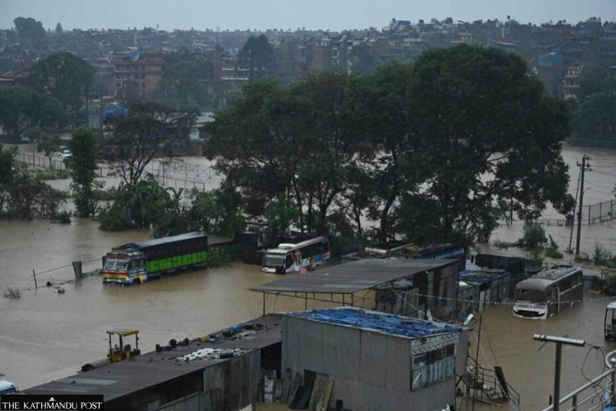 Monsoon floods sweep away 18 people and the main bridge linking Nepal to China