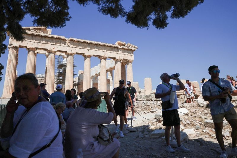 Greece shuts Acropolis for part of day as heat soars, bans outdoor work
