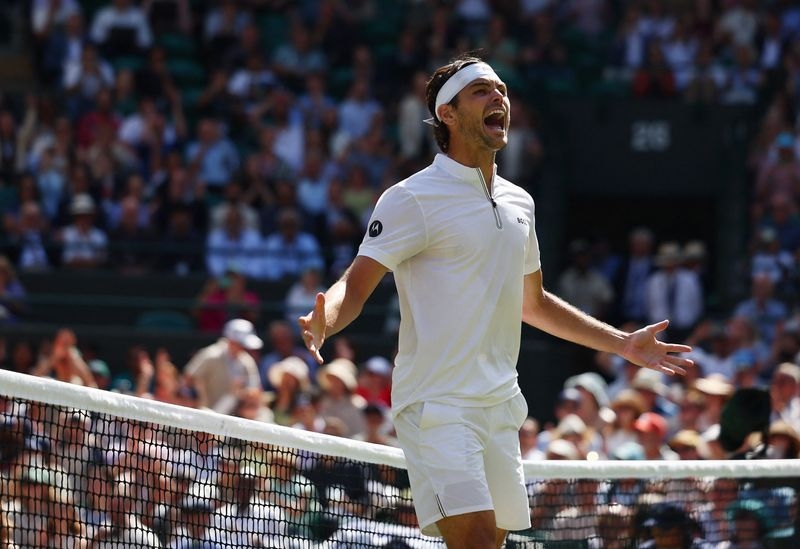 Tennis-Fritz into Wimbledon semis after holding off Khachanov comeback