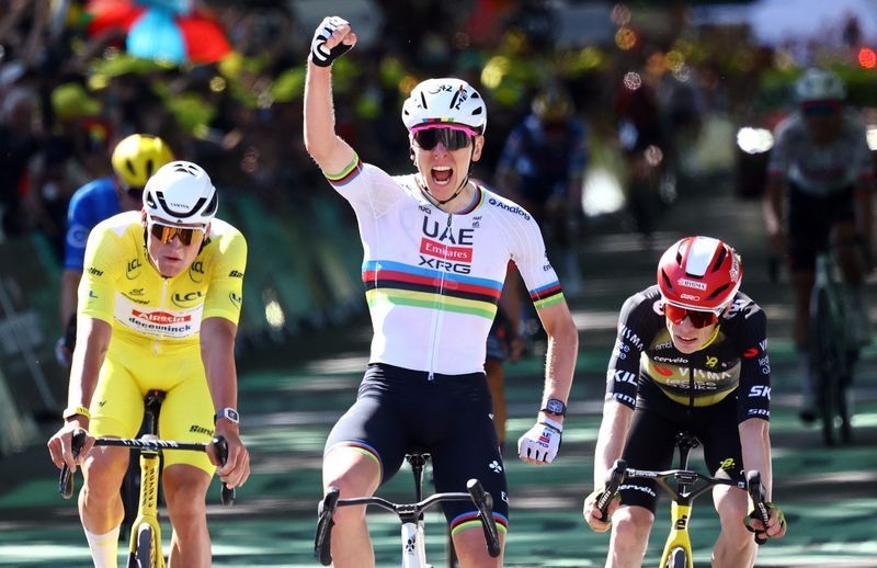 Cycling-Pogacar beats Van der Poel to win Tour stage four in 100th career victory