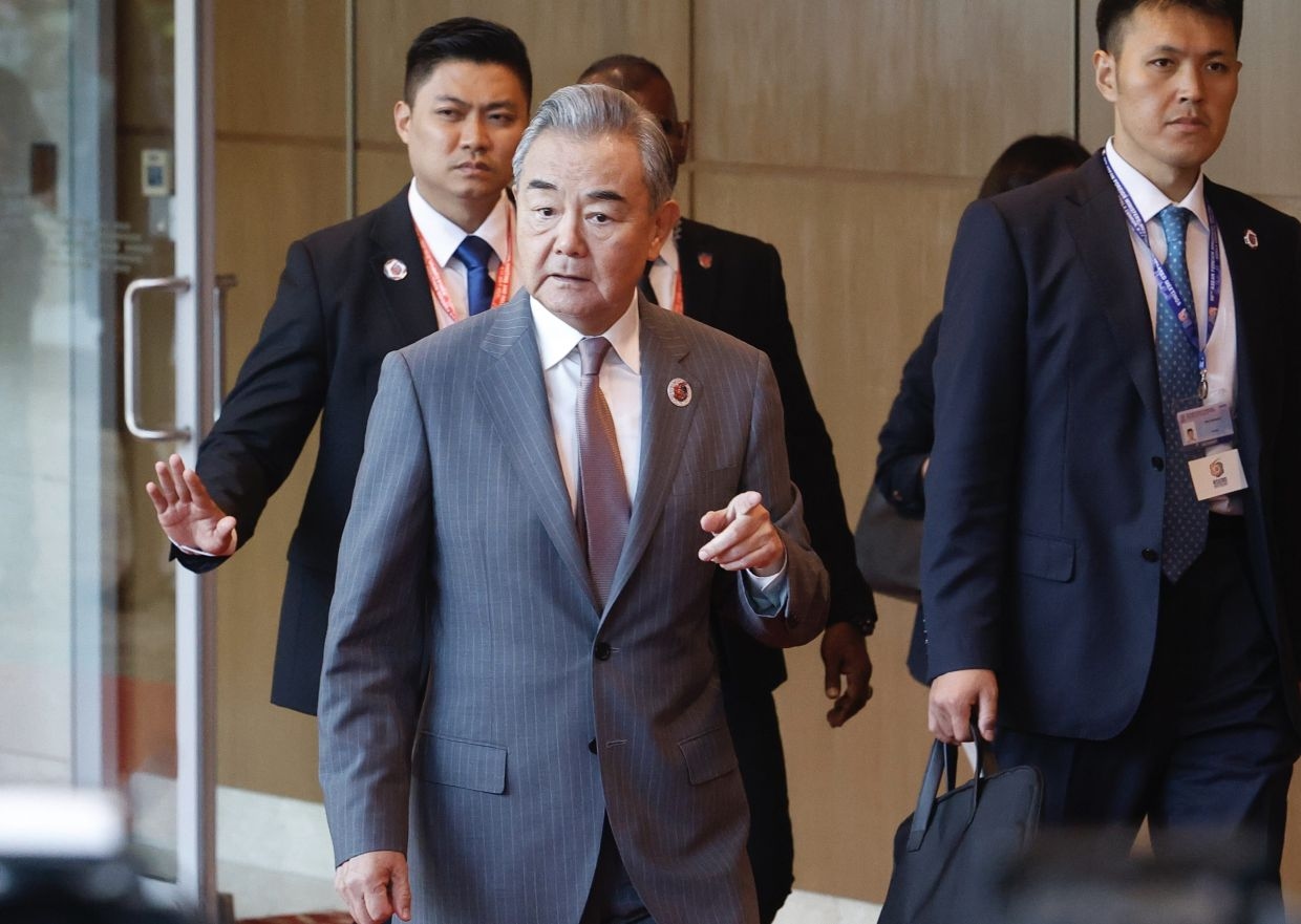 China opposes excessive tariffs, says China's Wang Yi