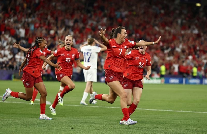Soccer-Swiss move through to Euro 2025 quarter-finals with late Xhemaili goal