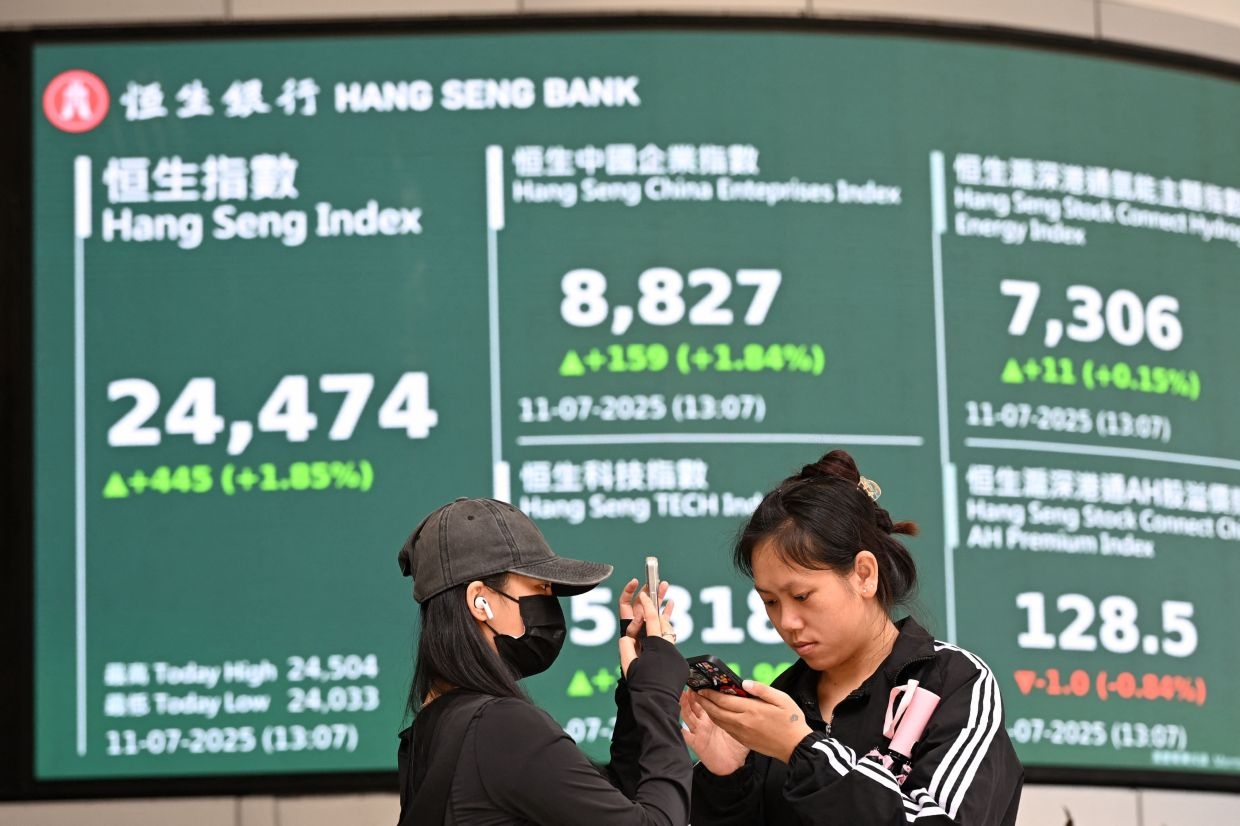 Asian markets mostly rise on lingering trade deal optimism