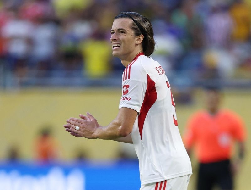 Soccer-Real sign their former youth player Carreras from Benfica