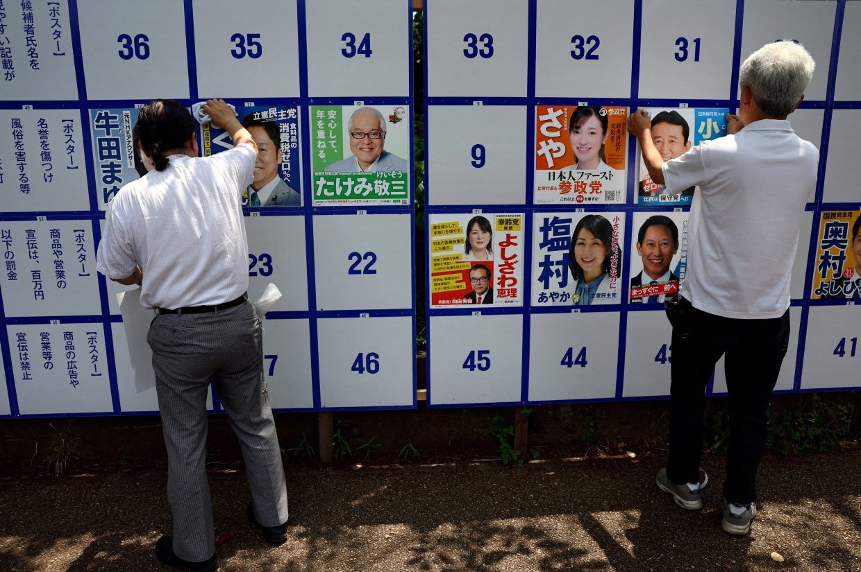 Japan ruling party support plunges ahead of national election in NHK poll
