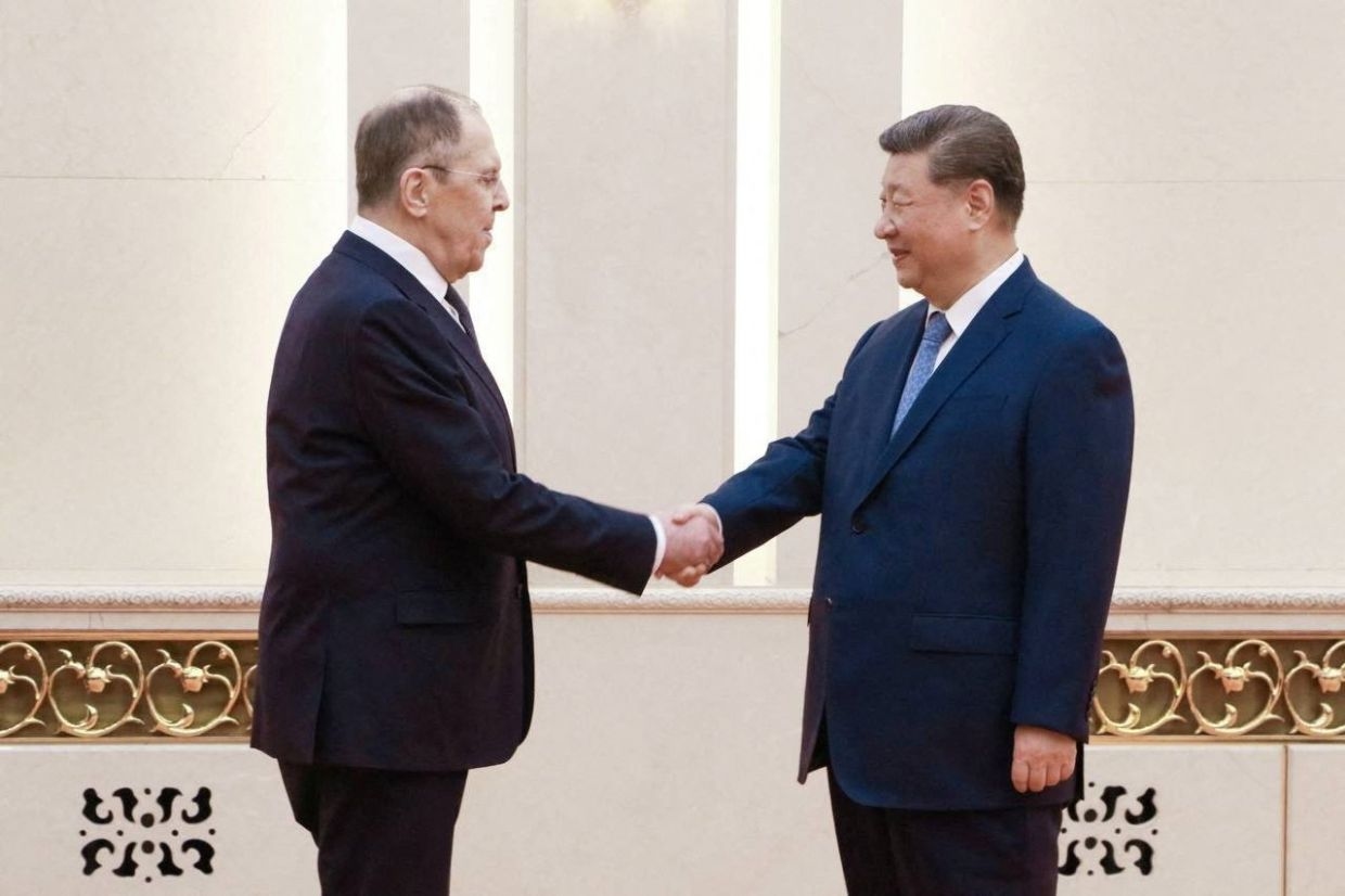 China's Xi vows greater support for Russia as meets Lavrov