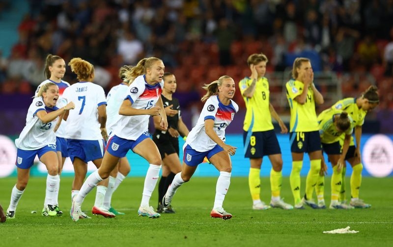 Soccer-'Beautiful craziness!', British media hails England victory in crazy shootout
