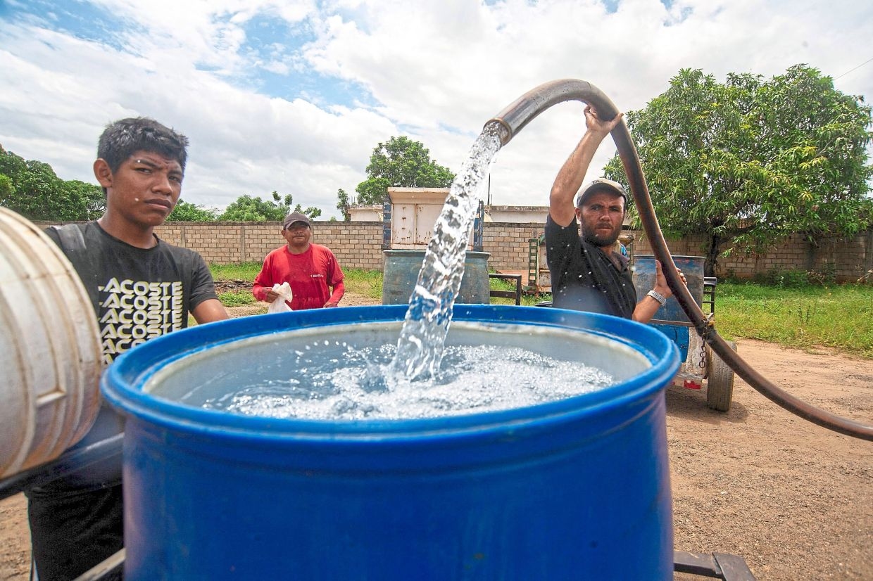 Parched oil capital drills for water
