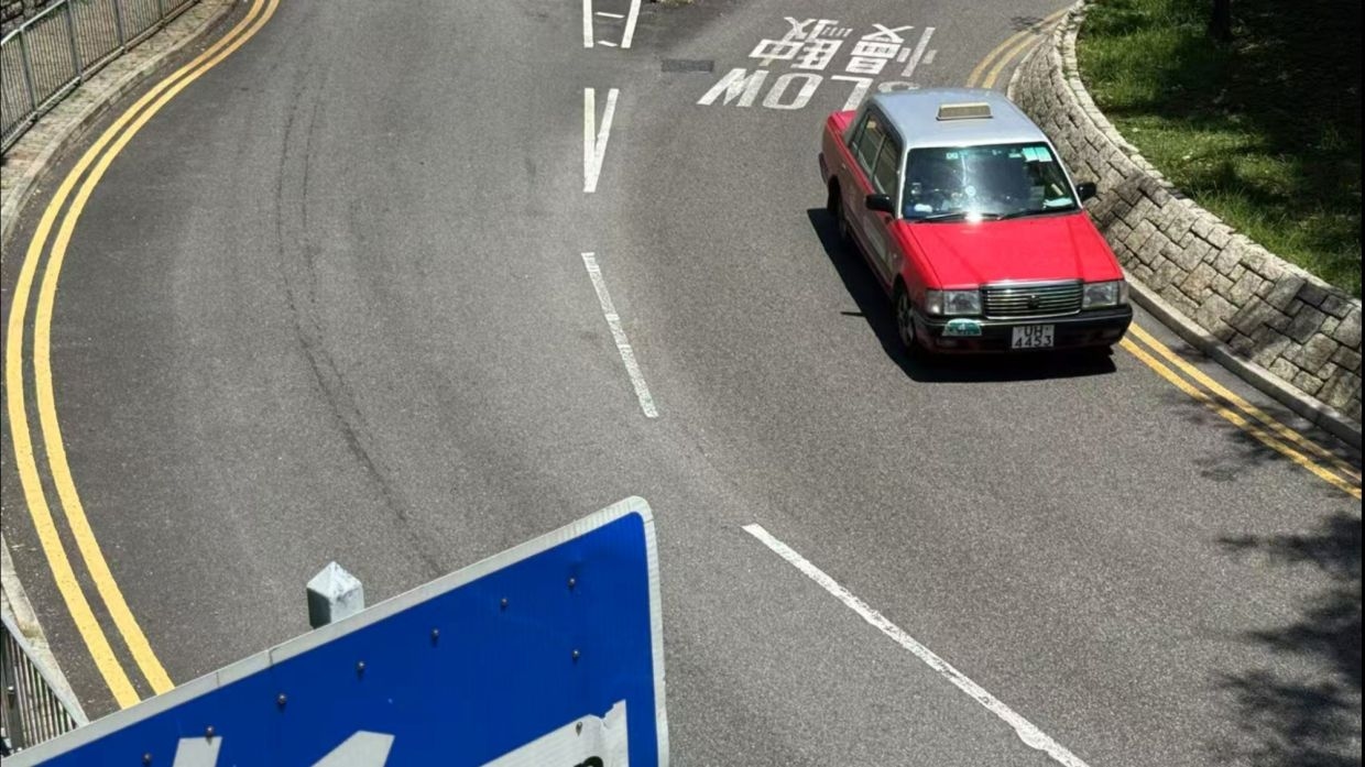 Taxi drivers, passengers welcome new mandatory e-payment rules in Hong Kong