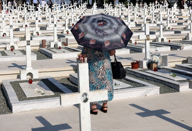 Greeks mourn, Turks celebrate anniversary of invasion splitting Cyprus