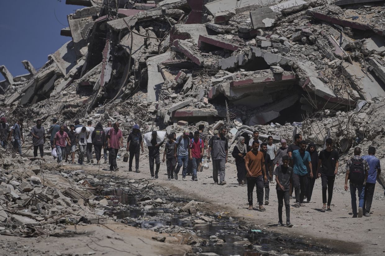 Israeli fire kills 67 aid seekers in Gaza, medics say, as hunger worsens
