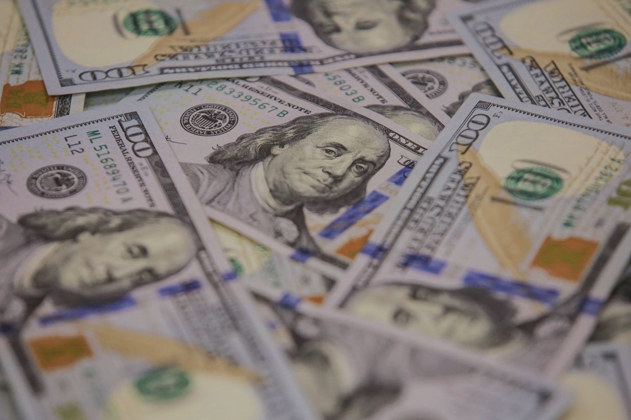Asian investors trim US assets amid weak dollar, but full pullback ‘difficult'