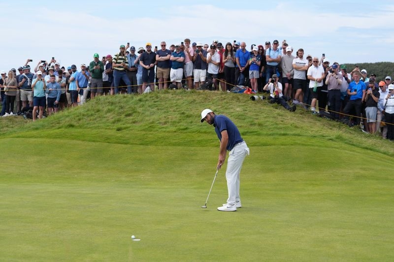 Golf-Dominant Scheffler cruises to British Open title