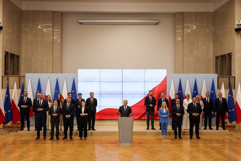 Polish PM presents reshuffled government, Sikorski to become deputy PM