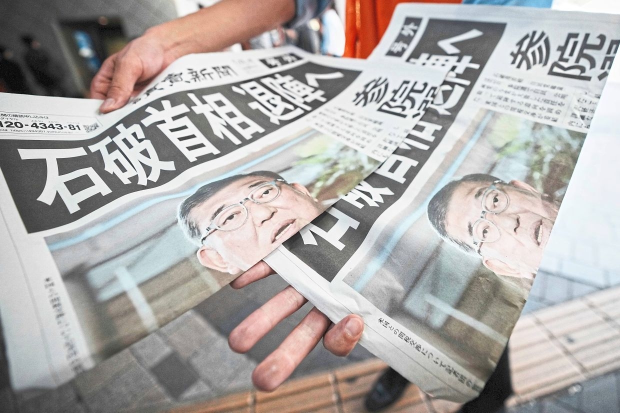 Ishiba denies talk of resignation