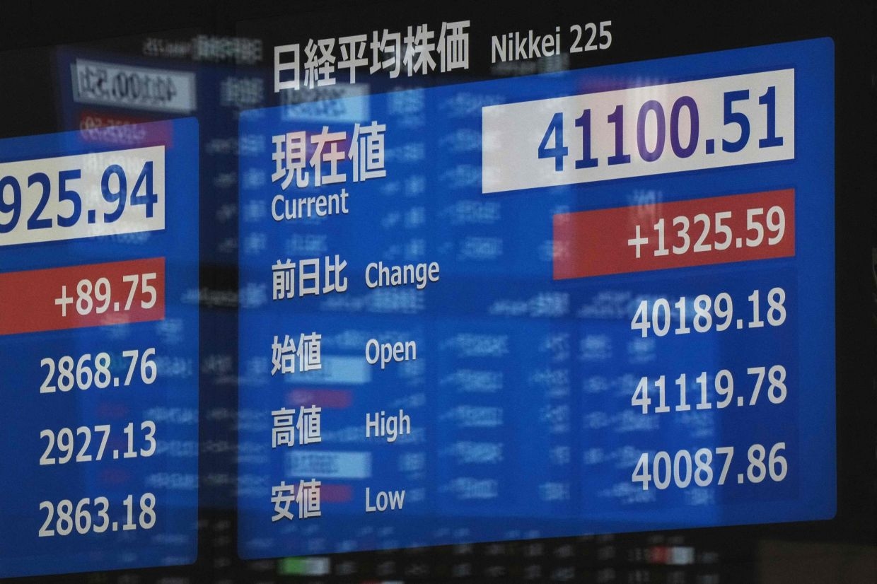 Asian markets extend gains on US trade deal hopes