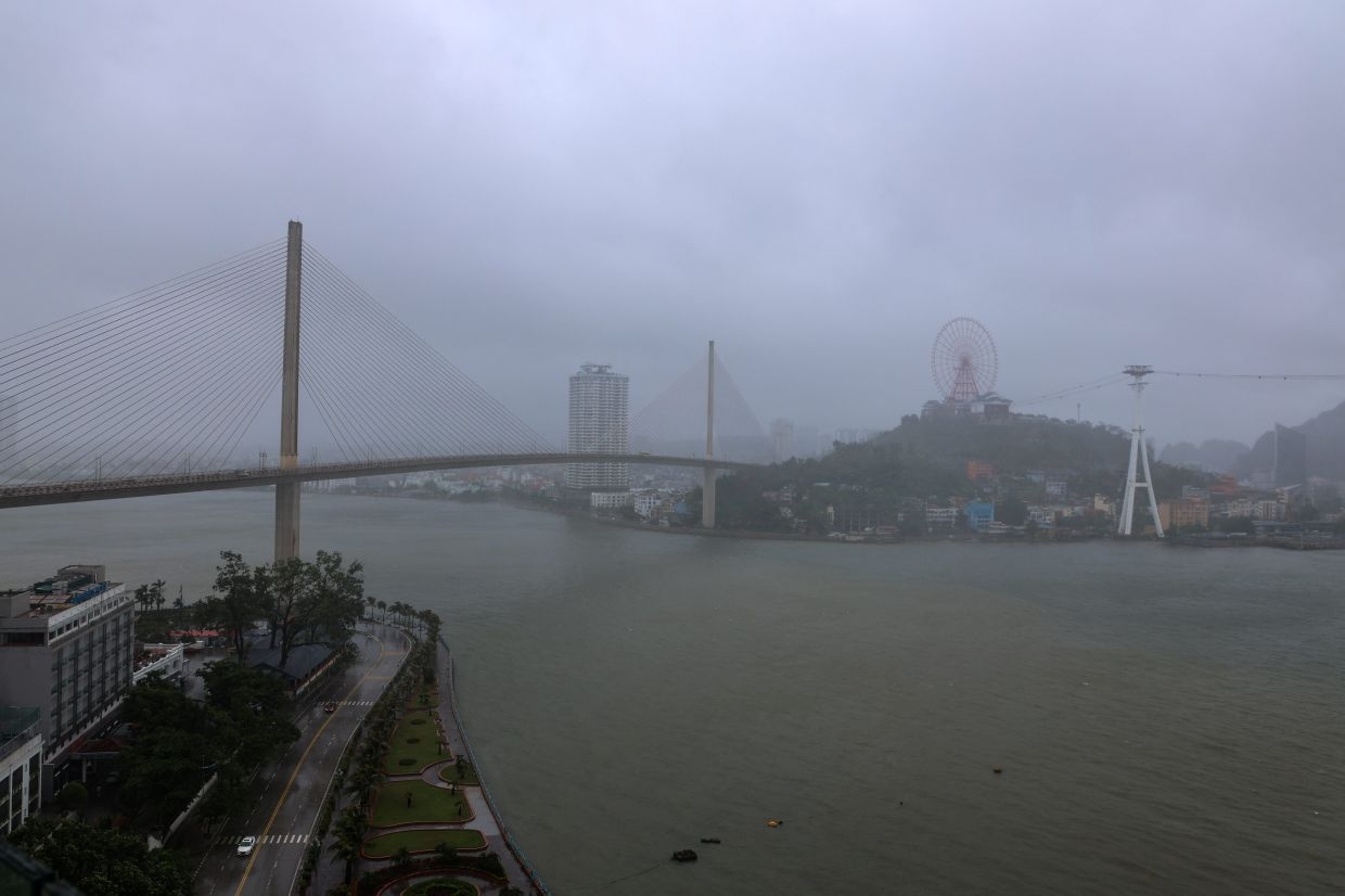 Heavy downpours and flooding from storm Wipha kill three in Vietnam; thousands of people evacuated