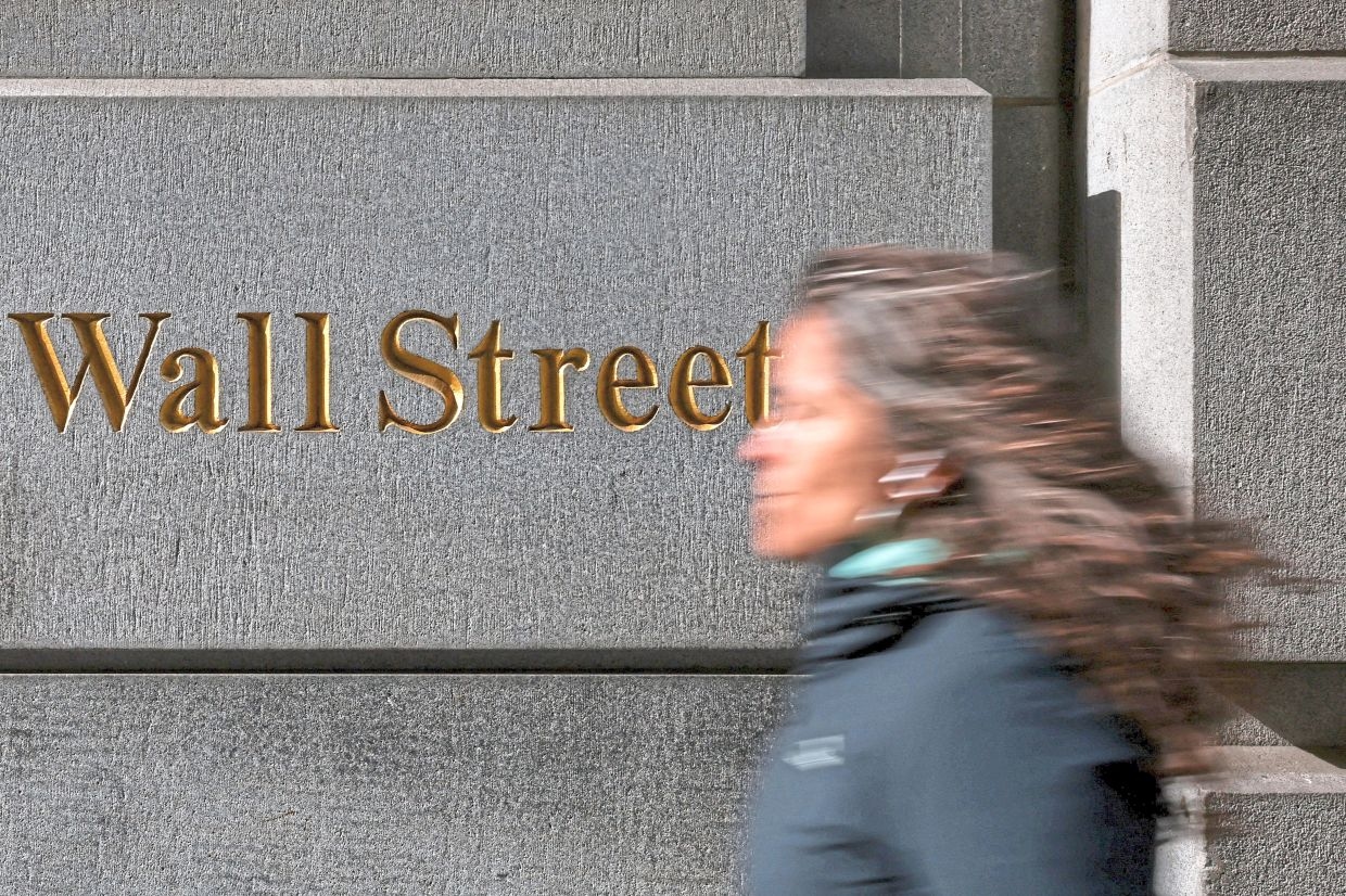 Wall St set for mixed start as investors digest Alphabet, Tesla results