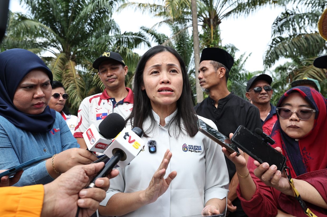 Calls to 997 scam hotline to be treated as police reports, says Deputy Comms Minister