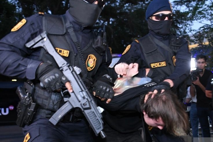 Russian media claims that Azerbaijani police beat and detained its citizens on false charges