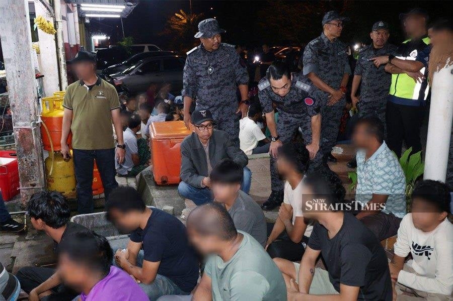 496 illegal immigrants nabbed in Seri Kembangan night raid